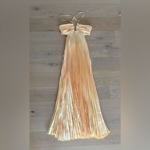 Pale yellow pleated Gown